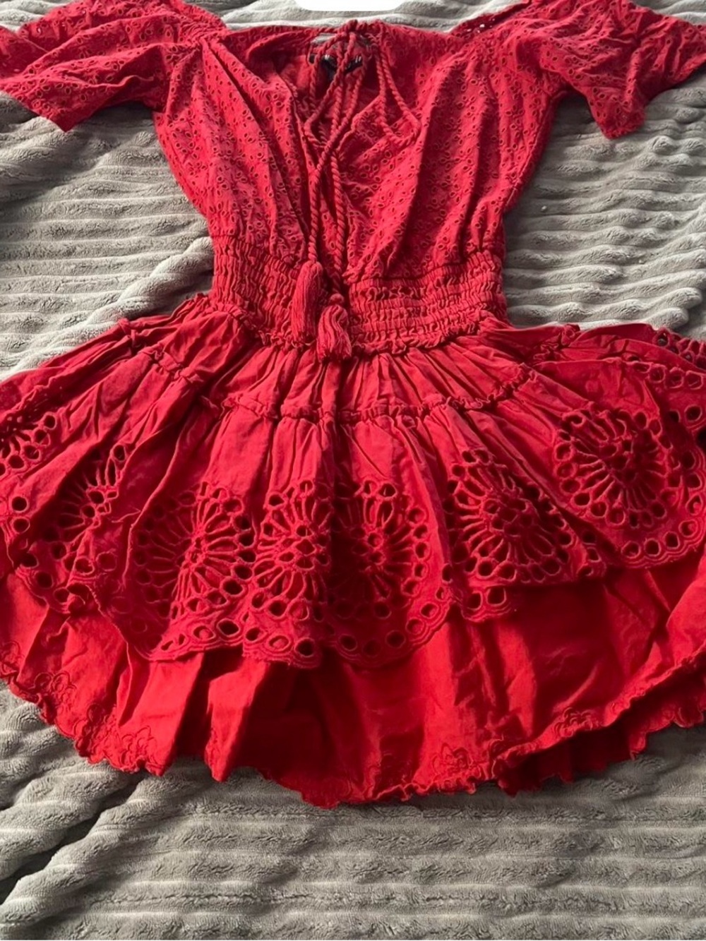 Red floral mini dress with tie-up front and layered skirt